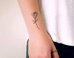 Cultivated in the far east and adopted by europeans, the rose was an emblem to be worn on armor and borne on one's shield, not simply bestowed upon a sweetheart. Temporary Tattoo Small Floral Etsy Rose Tattoos For Women Rose Tattoos For Men Tattoos