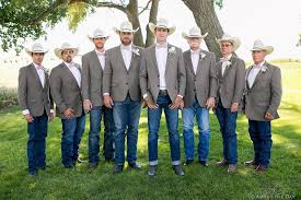 Cowboy Groom And Groomsmen Wearing Jeans Cowboy Wedding Attire Wedding Groomsmen Attire Rustic Groomsmen Attire My groom is wearing tan pants with a brow. wedding groomsmen attire