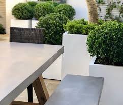 Concrete outdoor dining table & portside chairs set. Roma Polished Concrete Outdoor Dining Table Jo Alexander
