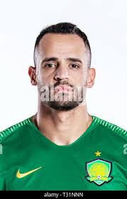 Brazilian football player Renato Soares de Oliveira Augusto, or simply Renato  Augusto, left, of Beijing Sinobo Guoan celebrates with his teammates aft  Stock Photo