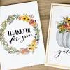 Cut out happy thanksgiving flags along gray dashed lines and write guests' names on each flag using a black or dark brown calligraphy marker or pen. 3