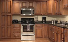 Kitchen Cabinet Trends 12 Hottest Kitchen Cabinets Medium Stained Maple With A Ri Restaining Kitchen Cabinets Maple Kitchen Cabinets Kitchen Cabinet Trends