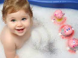 Smiling kid in bathroom with colorful toy duck. Cute Baby Taking Bath Image Nice Cute Baby 808x606 Wallpaper Teahub Io