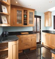 Industrial loft kitchen with black countertops , black cabinet hardware , black range hood and black ceiling. Simple Design Wooden Kitchen Cabinet With Black Countertop China Kitchen Cabinet Wooden Kitchen Cabinet Made In China Com