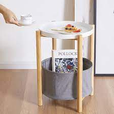 A round, wooden end table with a white coat of paint and black edges on the top. Bamboo Round End Table With Storage Basket Side Table With Serving Tray Console Tables Aliexpress