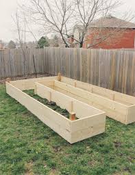 Love the addition of pvc pipes held upright to add fencing to your raised beds to keep out deer and rabbits! Project Grow Our Own Food Raised Garden Bed Reveal Brittany Stager