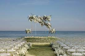 Modern Meets Glam At This Uber Chic Wedding In Thailand Ruffled Wedding Beach Ceremony Beach Wedding Destination Beach Wedding Arch