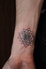 Minimal tattoos are fine lines that can express so much, so let's get back to simpler forms and tattoo designs and make them even more popular. 75 Graphically Gorgeous Geometric Tattoos