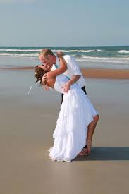 The Dip Kiss At Beach Wedding In Daytona Beach Florida Destination Wedding Beach Wedding Photography Wedding Photographers Wedding Photography