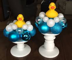 Turn your party table into a tub full of bubbles! Diy Rubber Ducky Centerpieces Candle Bases Bath Body Works Boy Baby Shower Centerpieces Diy Baby Shower Decorations Baby Shower Decorations For Boys