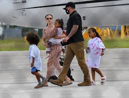 'coming soon!' north west models kanye and kim kardashian's kids clothing line. Kim Kardashian Kanye West Their 4 Kids Arrive In Miami Photos Hollywood Life