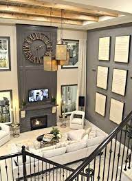 Our team of design professionals is available to answer any questions you may have at: Two Story Fireplace Wall Idwebs Info High Ceiling Living Room Tall Ceiling Living Room Family Room Fireplace