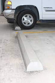 Illegally parked cars blocking your driveway? Parking Curbs Bumpers Century Group