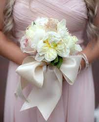 I bought four bouquets and 16 corsages and boutonnieres for just under $225. 13 Pretty Ways To Wrap Your Bouquet