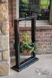 Rustic carved wooden hanging planters. Hanging Basket Wood Stand Shanty 2 Chic