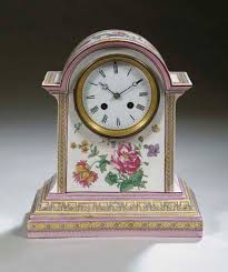 Maybe you would like to learn more about one of these? A Gien Faience Floral Mantel Clock
