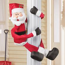 Santa claus with their reindeer and gifts. Mr And Mrs Claus Outdoor Plush Huggers Decor Collections Etc