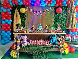 Create your own party plan and remember to include invitations, decorations, games, activities, party food, beverages, party cake, party snacks, gift bag favors, costumes and gifts. Lilo And Stitch Birthday Party Decorations Birthday Party Theme Decorations Luau Birthday Party