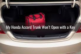 I approach the car, with my key fob in my pocket, and grab the driver's door handle. How To Fix Problems With Your Honda Accord Trunk Know My Auto