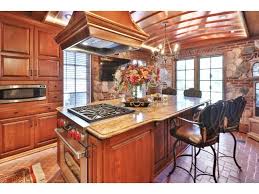 The Kitchen Features Subzero And Wolf Appliances Custom Cherry Cabinetry Granite Counters And Custom Matched Terr Kitchen Inspirations Kitchen Custom Matches