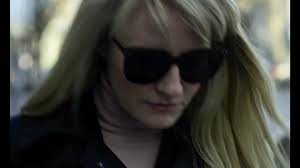 WOMAN IN CAR. TRAILER