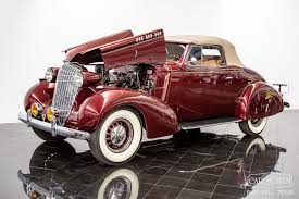 Image result for Mansion Maroon 1938 Oldsmobile