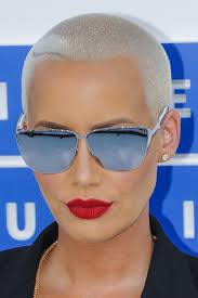 Amber rose is known for her iconic bleached blonde buzzcut, and in a new interview, she's finally dishing on why she hasn't changed her trademark style in 14 years. Amber Rose Straight Silver Buzz Cut Hairstyle Steal Her Style