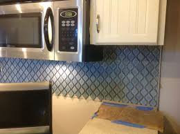 Metal tile edging (for the backsplash since the tile we want doesn't have bullnose options). Arabesque Blue Tile Backsplash Using An Adhesive Mat Hometalk