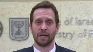 Afghan baby passed over razor wire to US soldiers reunited with mother