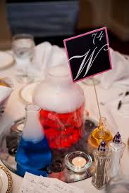 Chemistry Wedding Centerpieces Glassware Colored Water And Dry Ice Wedding Centerpieces Chemistry Wedding Wedding