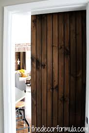 The rear has horizontal lengths of wood known as ledges and diagonal ones called braces, giving the door stability and strength. Diy Barn Doors How To Build A Sliding Barn Door For Cheap The Decor Formula