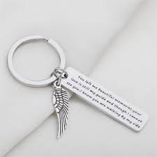 In memory of jewelry is a wonderful way to keep the memory of someone you adore close to you at all times. Amazon Com Memory Bracelet With Guardian Angel Loss Jewelry Remember Loved One You Left Me Beautiful Memories Bracelet Bar Keychain Clothing