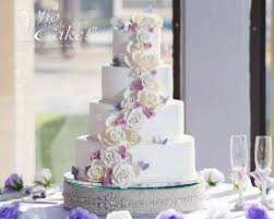 This Quince Cake Has Stunning Sugar Flowers Petite Butterflies Quincecake Floralweddingcake Wed Butterfly Wedding Cake Wedding Cakes Classic Wedding Cake