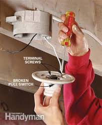 If the light isn't working, test the bulb receptacle with a voltage tester. How To Replace A Pull Chain Light Fixture Diy Family Handyman
