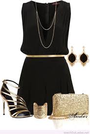 A Black Dress And Golden Accessories Fashion Fashion Designers Famous Famous Fashion