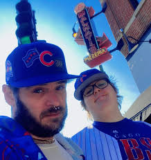 Celebrating Cubs win with Lou's deep dish pizza