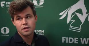 Carlsen goes shopping for new jeans, arrives a minute late for 3-min game,  and wins it