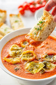 I like to process one of the cans of tomatoes briefly in the food processor to chop up the tomatoes more finely. Tortellini Tomato Soup Recipe Saving Room For Dessert