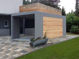 Laumer Garagenbau Carport Foto Laumer Die Alternative Garage Massiver Carport Mit Schoner Dachterasse Laumer Ga Fertiggaragen Carport Anbau Gartenhaus
