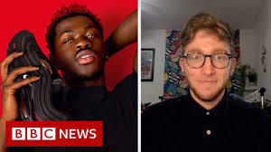 Lil nas x spoofs 'satan shoes,' reactions to his sexuality, justice clarence thomas in 'industry baby' single trailer. Why I Bought The Lil Nas X Satan Shoes Bbc News Youtube