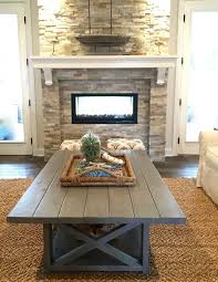 Modern wooden coffee table designs. Coffee Table And Double Sided Stone Fireplace Rustic Living Room New York By Raymour Flanigan Furniture And Mattresses Houzz