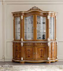 Pairing the best of form and function, these credenzas provide extra dining room storage, a surface to catch table overflow and a gorgeous display case for your favorite serving dishes or delicate keepsakes. Classic China Cabinet Bella Vita Modenese Interiors Luxury Furniture Glass Wooden