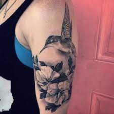 We noticed that the tattoo owners of these cute avian beauties are not just women, as we expect them to be. 125 Best Hummingbird Tattoo Ideas For 2019 1000 Tattoo Photo Eddnet
