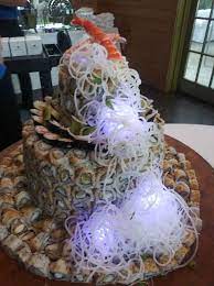 Sushi and raw bars are always popular at any kind of wedding, this idea offers perfect bites that are easy for guests to pop into their mouths. Sushi Wedding Cake My Hotel Made Tonight Sushi