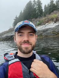 My son is kayaking near Whaleboat Island in the Gulf of Maine.