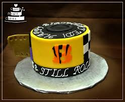 Learning to decorate cakes is a matter of experience. A Birthday Cake For A Man Who Loved Photography And Cincinnati Bengals Cakecentral Com