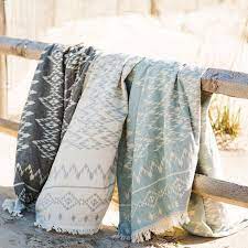For instance, wool blankets are some of the warmest, but they can be a bit scratchy and must be washed carefully. Turquoise Blanket Throw Boho Bedding Festival Throw Etsy Turkish Towels Outdoor Blankets Picnic Towel