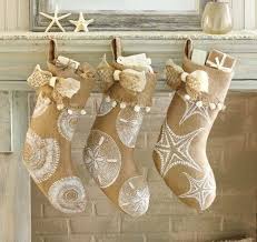 If you have a daughter who loves mermaids, you will love the mermaid themed xmas stockings that look like a mermaid tail. Beachy Burlap Christmas Stocking Set Coastal Christmas Stockings Beachy Christmas Coastal Christmas Decor