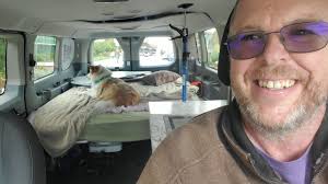 Solar-powered passenger van camper conversion