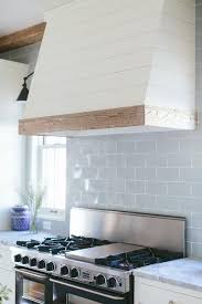Blue Glazed Subway Kitchen Backsplash Tiles Transitional Kitchen Kitchen Tiles Backsplash Natural Wood Trim Kitchen Range Hood
